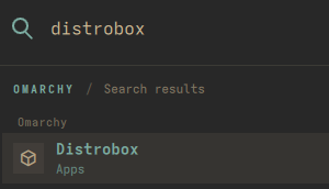 The Distrobox row in the Omarchy menu