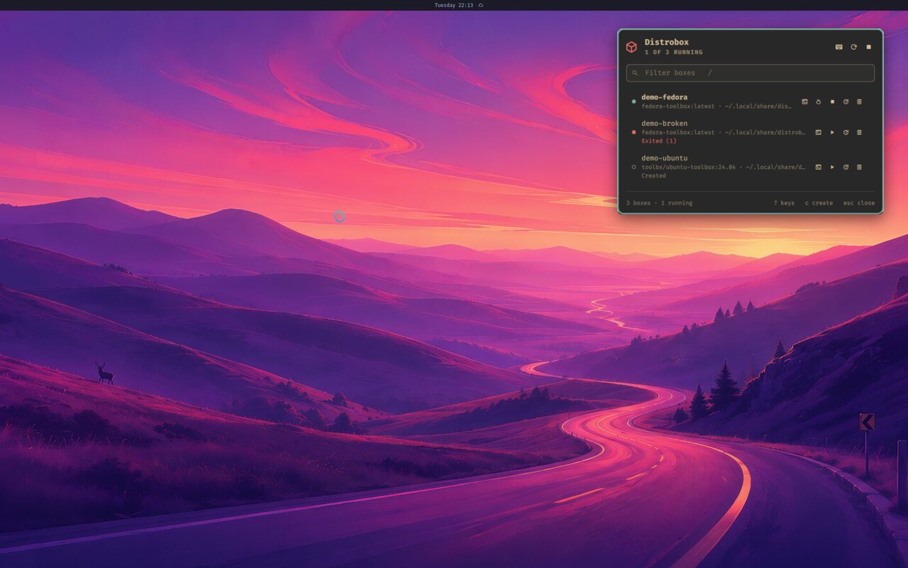 The Distrobox panel: one box running, one exited, one created